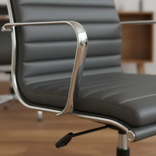 Close-up of the Laura Davidson SOHO chair showcasing its ribbed leatherette, polished chrome armrests, and height adjustment lever.